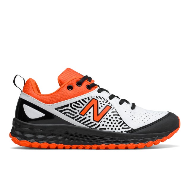 Black and orange outlet new balance turf shoes